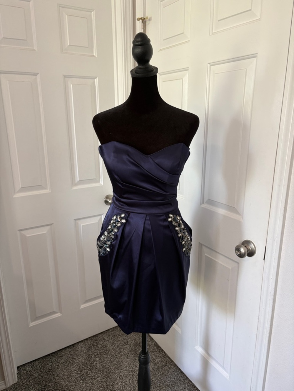 B. Smart Strapless Navy Satin Cocktail Dress with Embellished Pockets